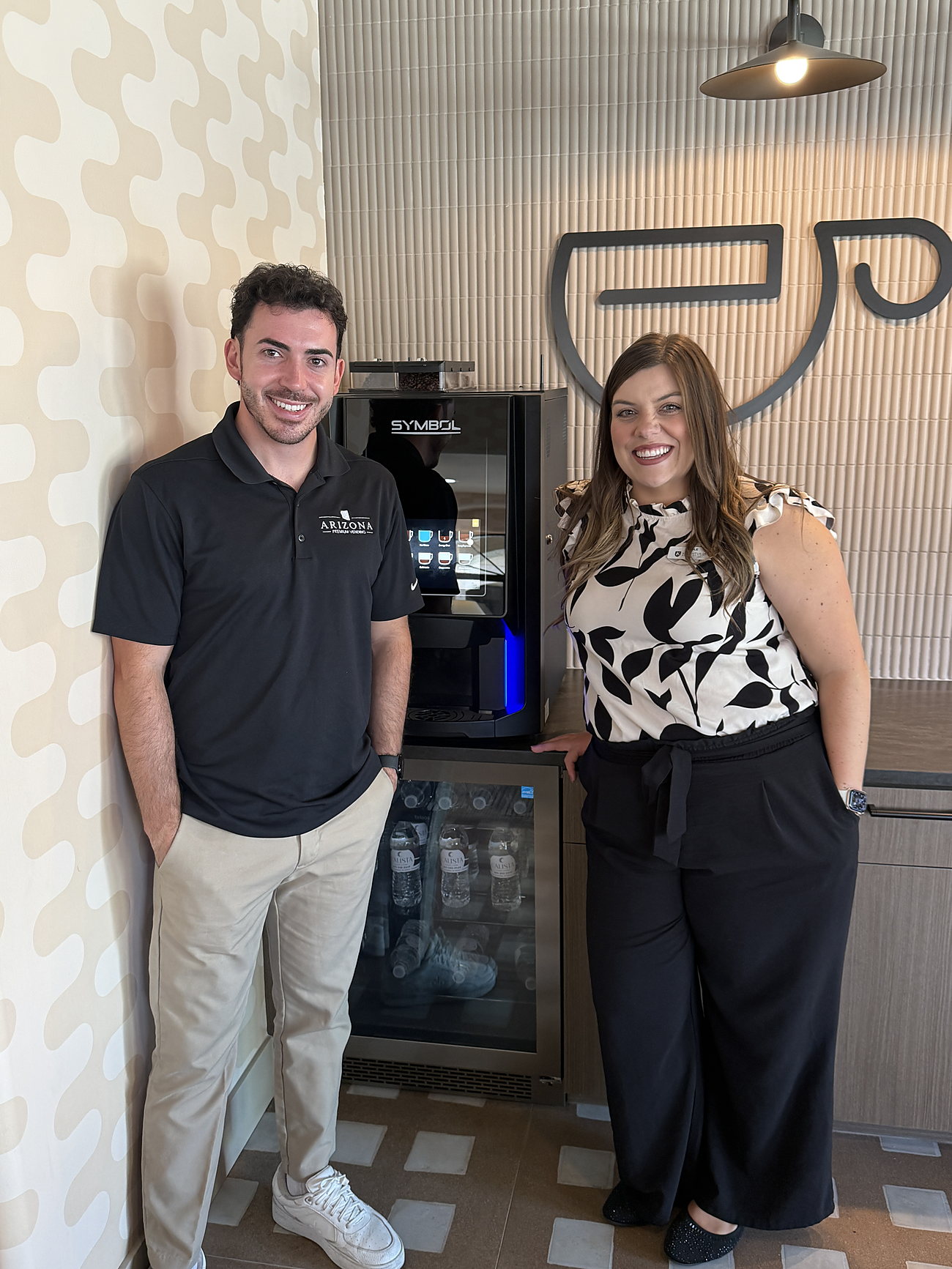 Arizona Premium Vending with the Calista Apartments team at the community's new Symbol coffee machine in Scottsdale